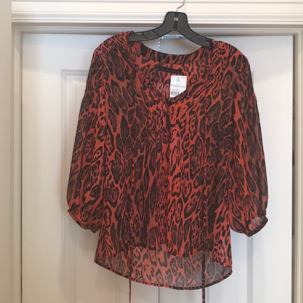 Orange and black top